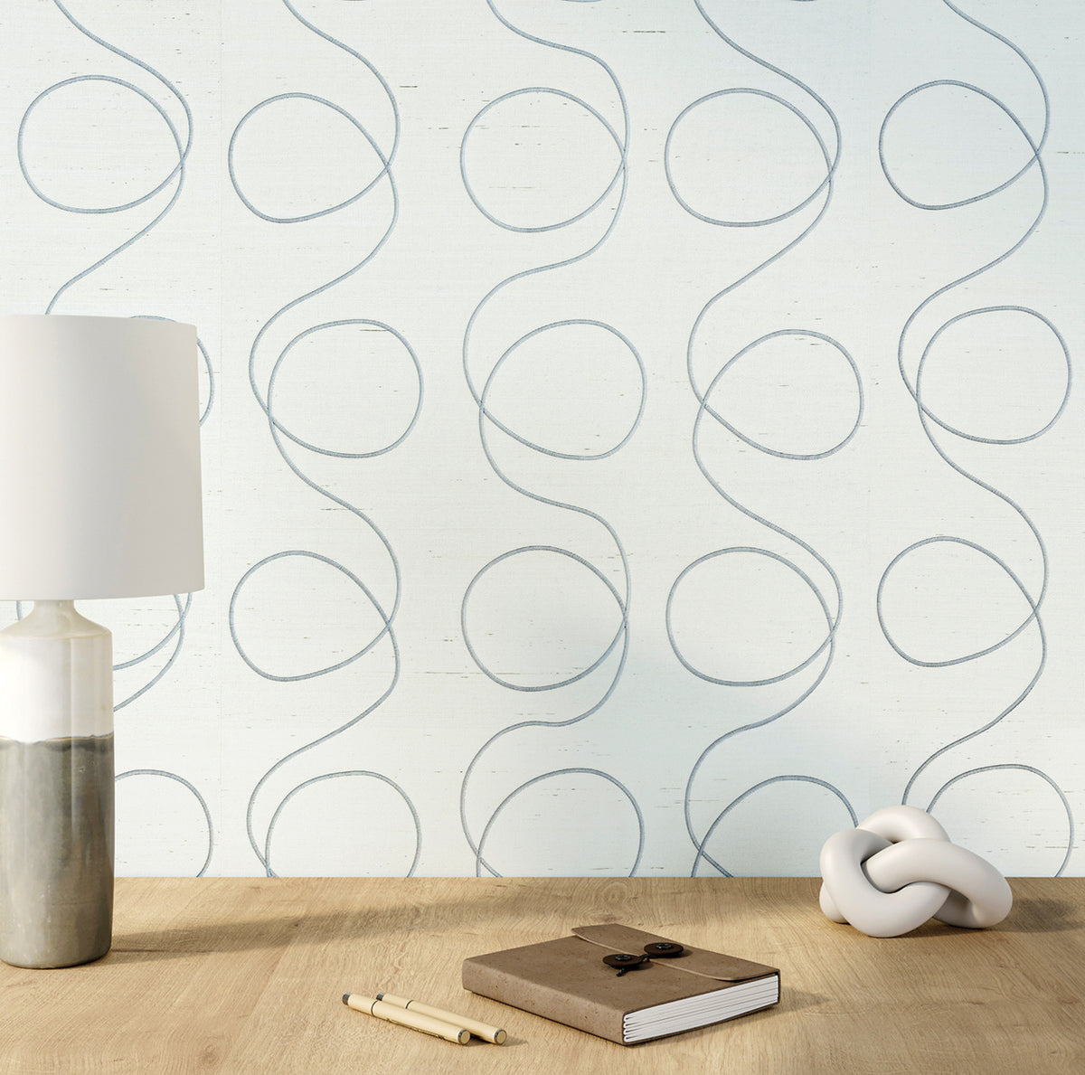 Scribbles Wallpaper by Phillip Jeffries in Beige with White, shown installed in a room setting
