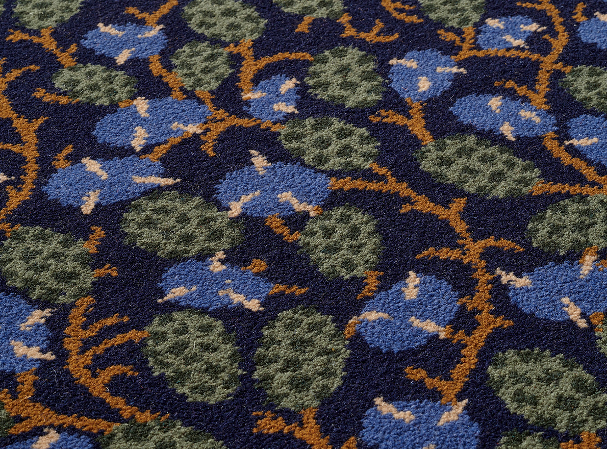 Sennefer Rug by Pierre Frey shown in a room setting (view 1)