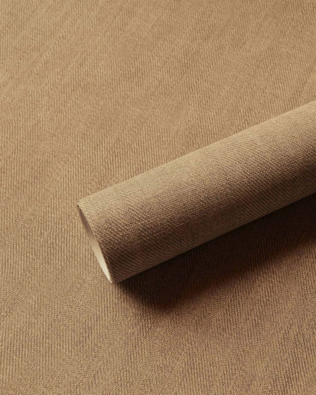 Sergé wallpaper by Coordonné in Ocre, shown in a styled room