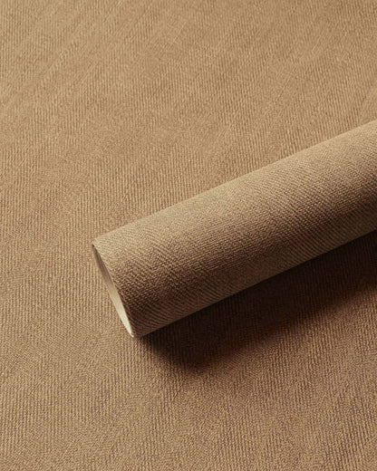 Sergé wallpaper by Coordonné in Ocre, shown in a styled room