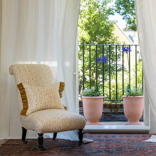 Serrata Printed Linen Fabric by Volga Linen in Oyster/Old Gold, styled view 1