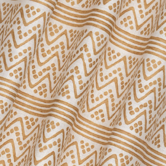 Sheherazade Printed Linen Fabric by Volga Linen in Washed Gold/Oyster, rippled to show the drape