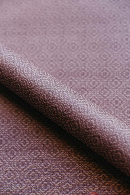 Sisal wallpaper by Coordonné in Cava/Rosa, shown in a styled room