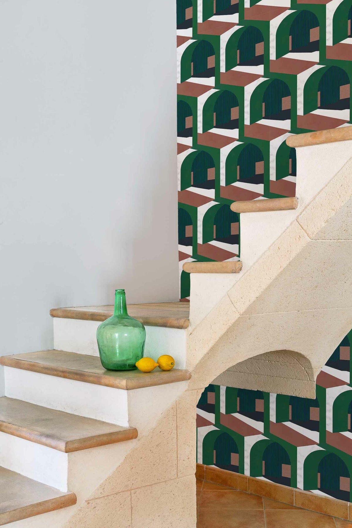 Soller wallpaper by Coordonné in Green, shown in a styled room