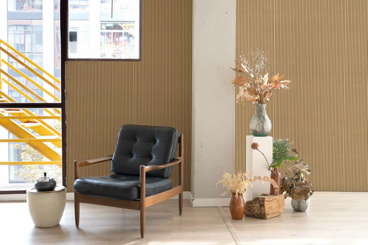 Stripe 0,7 wallpaper by Coordonné in Curry, shown in a styled room