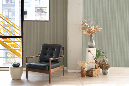 Stripe 0,7 wallpaper by Coordonné in Matcha, shown in a styled room