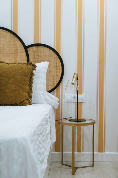 Stripe 5 wallpaper by Coordonné in Curry, shown in a styled room