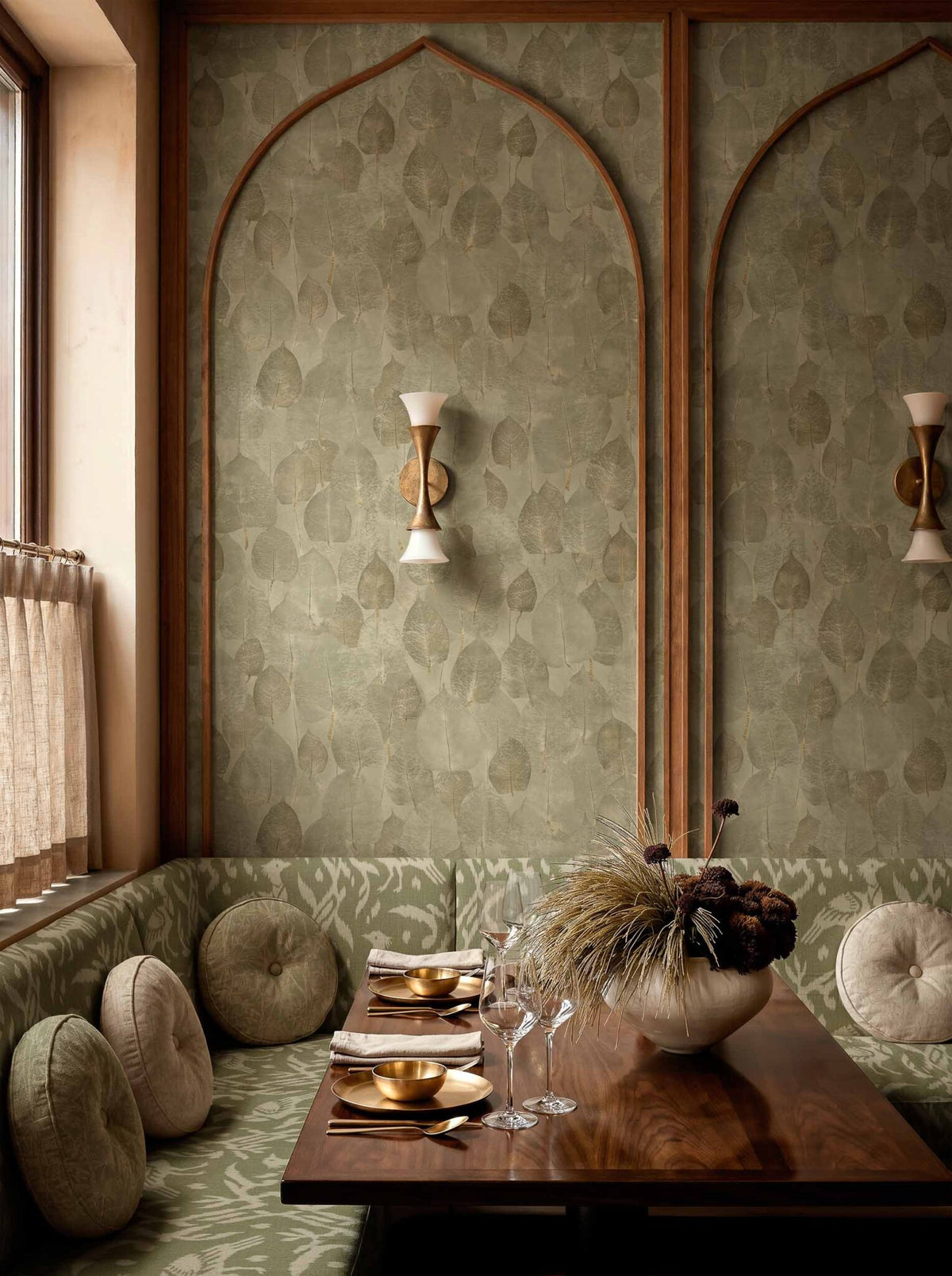 Suman wallpaper by Coordonné in Moss, shown in a styled room