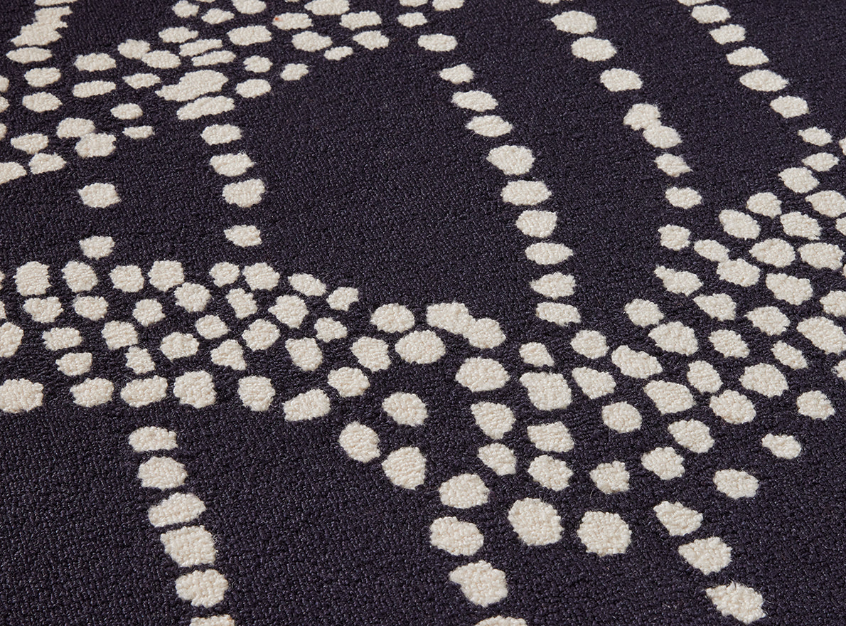 Tasmania Rug by Pierre Frey shown in a room setting (view 1)
