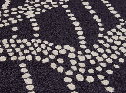 Tasmania Rug by Pierre Frey shown in a room setting (view 1)