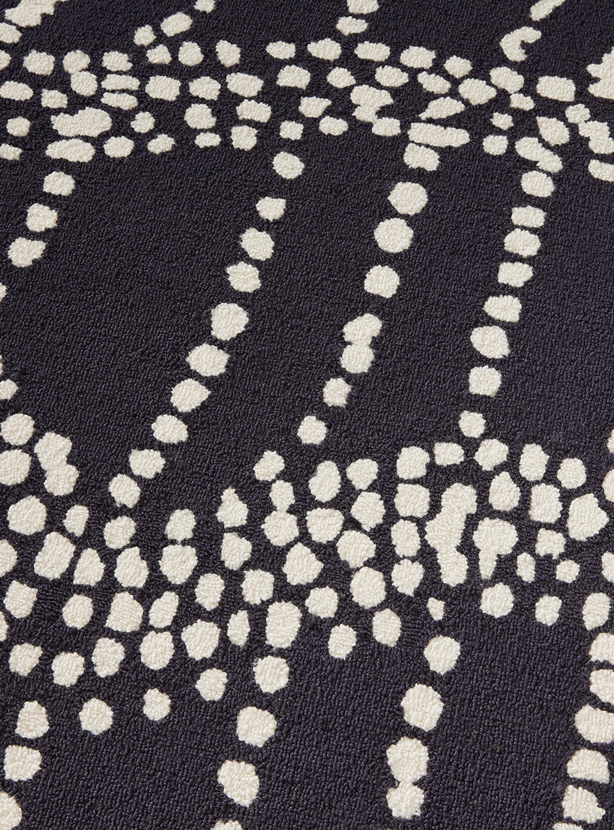 Tasmania Rug by Pierre Frey shown in a room setting (view 2)