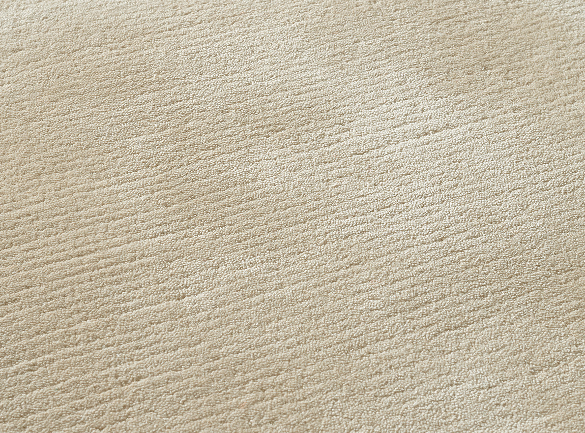 Thabor Loop Rug by Pierre Frey shown in a room setting (view 1)