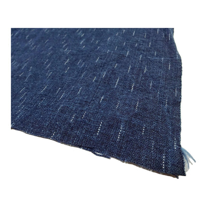 The ReBorn House TRH5779 Chiri-Gasuri Scattered Indigo Ikat Cotton in Kon Ground, colorway TRH5779.A, folded on white