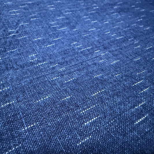 The ReBorn House TRH5779 Chiri-Gasuri Scattered Indigo Ikat Cotton in Kon Ground, colorway TRH5779.A, flat fabric swatch