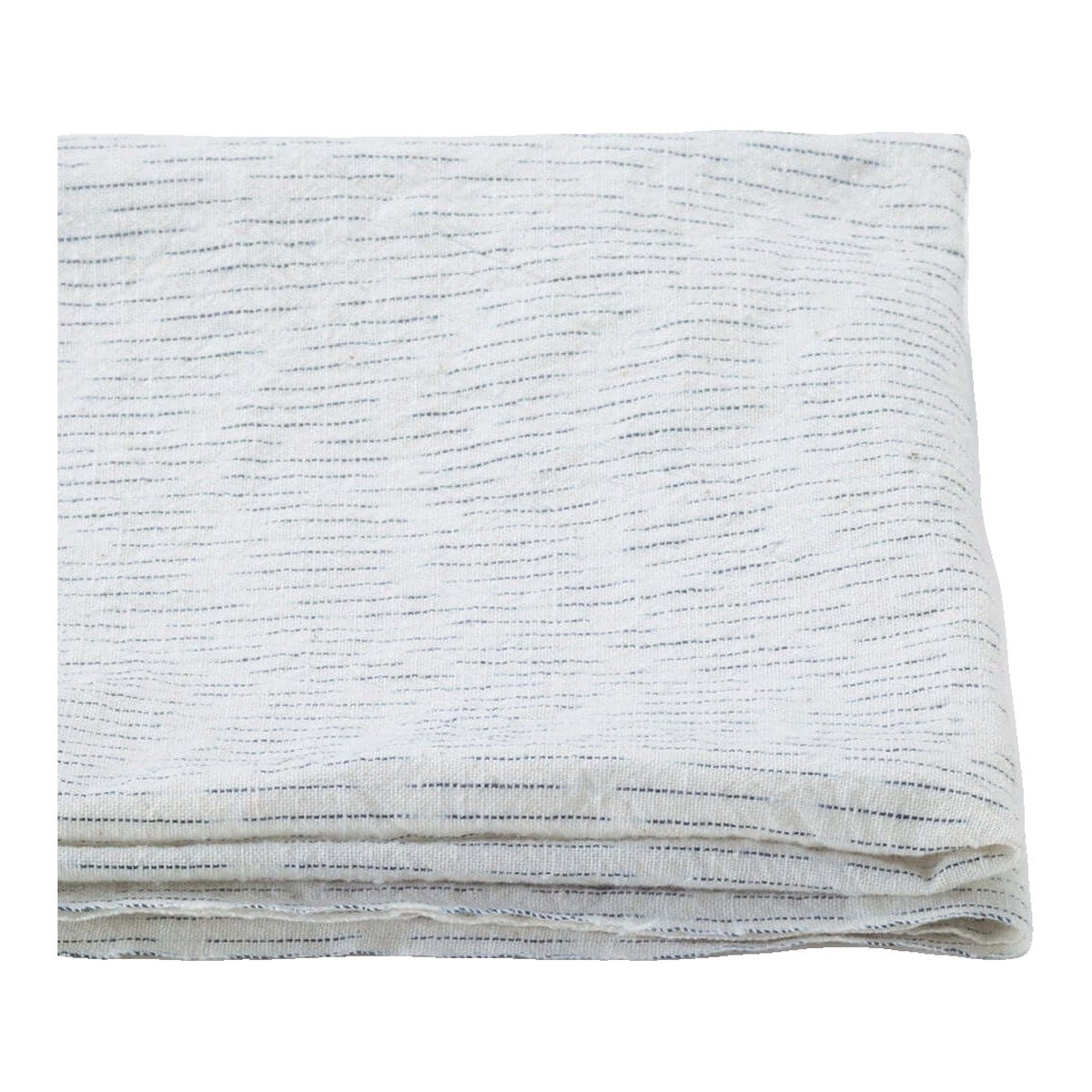 The ReBorn House TRH5779 Chiri-Gasuri Scattered Indigo Ikat Cotton in Shiro Ground, colorway TRH5779.B, folded on white