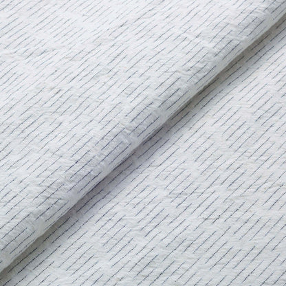 The ReBorn House TRH5779 Chiri-Gasuri Scattered Indigo Ikat Cotton in Shiro Ground, colorway TRH5779.B, flat fabric swatch