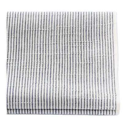 The ReBorn House TRH5792 Matsusaka Momen Shiro-Jima Aizome Stripe in Kinari with Ai Stripe, colorway TRH5792.A, folded on white