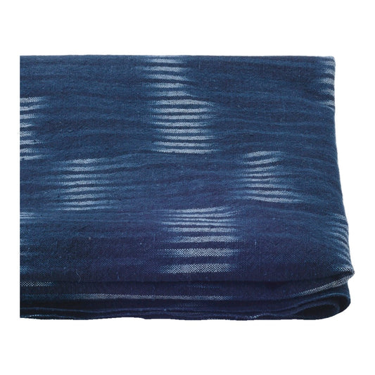 The ReBorn House TRH5800 Bingo-Gasuri Han-Gasuri Indigo Ikat Cotton in Kon Bold Ikat, colorway TRH5800.A, folded on white