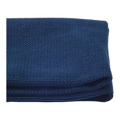 The ReBorn House TRH5804 Sashi-Ori Heavyweight Woven Sashiko Cotton in Ai Indigo, colorway TRH5804.A, folded on white