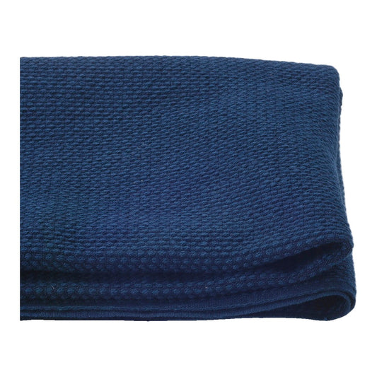 The ReBorn House TRH5804 Sashi-Ori Heavyweight Woven Sashiko Cotton in Ai Indigo, colorway TRH5804.A, folded on white