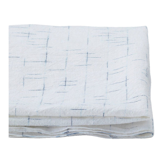 The ReBorn House TRH5809 Midare-Gasuri Indigo Ikat Kinari Cotton in Kinari with Ai Ikat, colorway TRH5809.A, folded on white