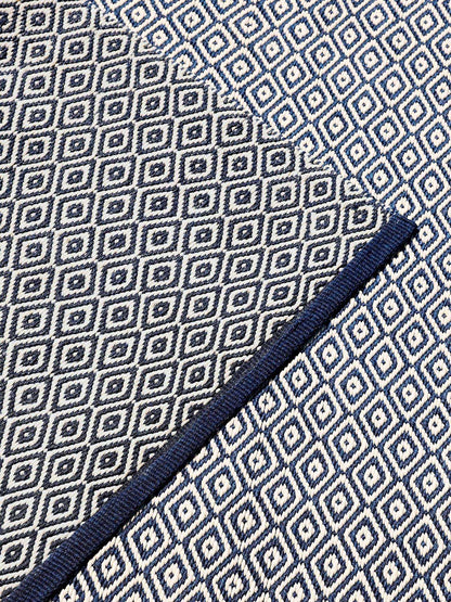 Tortola Rug by Pierre Frey shown in a room setting (view 2)