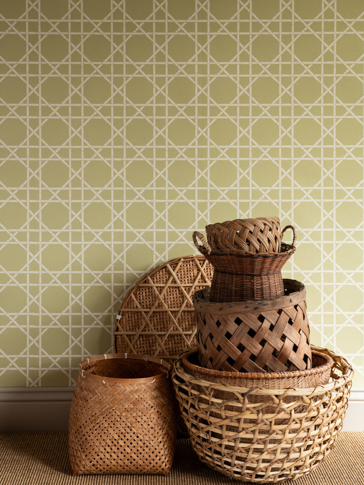 Trellis Wallpaper by Langelid Von Bromssen in Dusty Lemon, room view