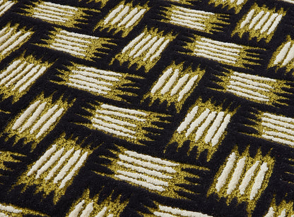 Tressage Rug by Le Manach shown in a room setting (view 1)