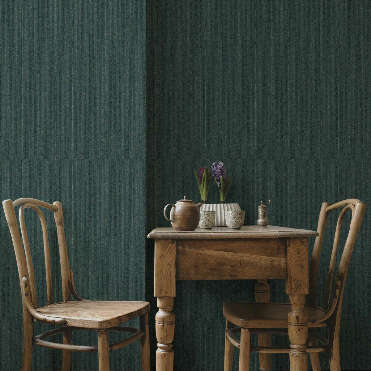 Twill wallpaper by Coordonné in Acqua, shown in a styled room