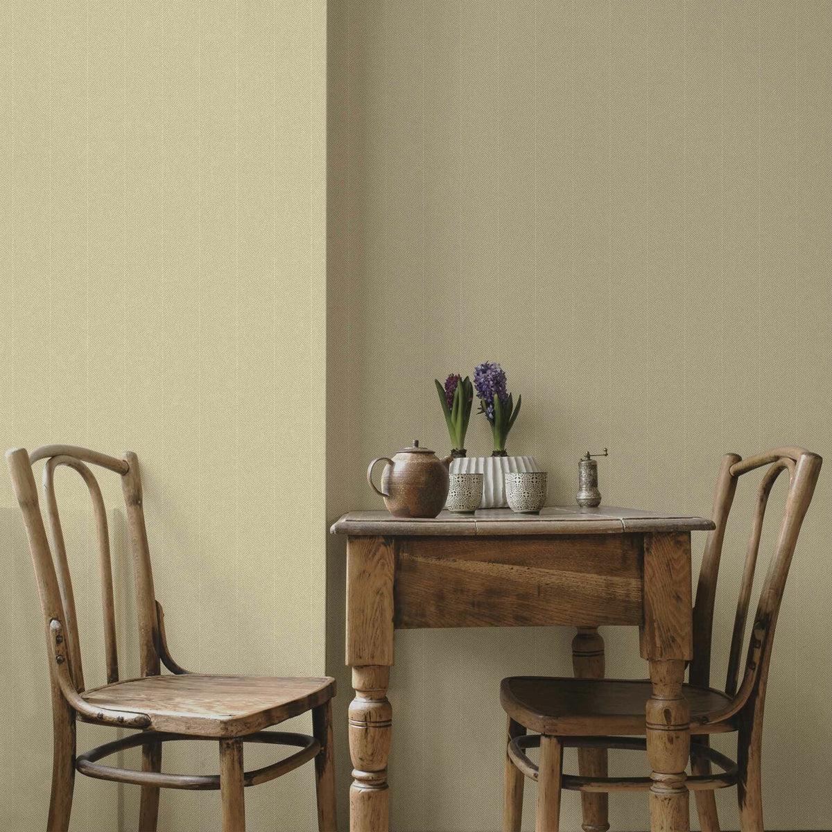 Twill wallpaper by Coordonné in Cream, shown in a styled room