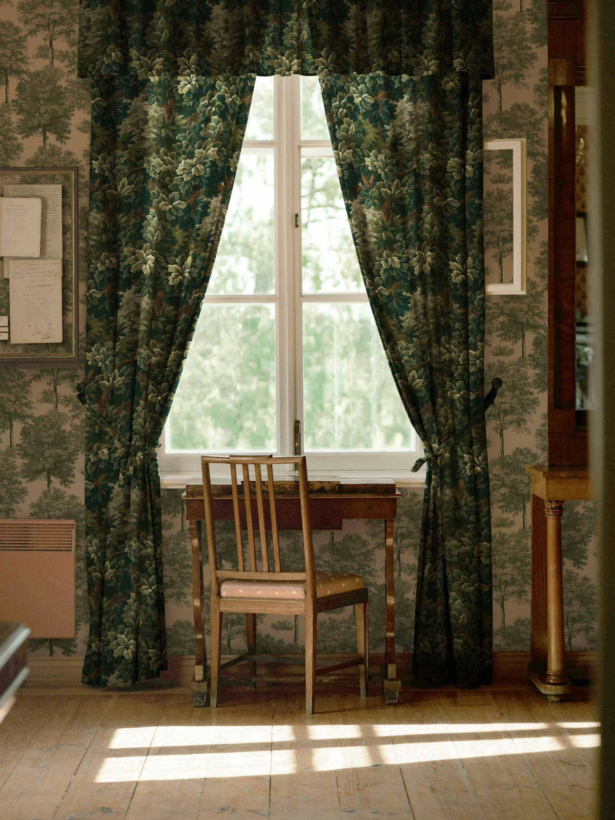 Verdure 16th fabric by Coordonné in Green, shown in a styled room