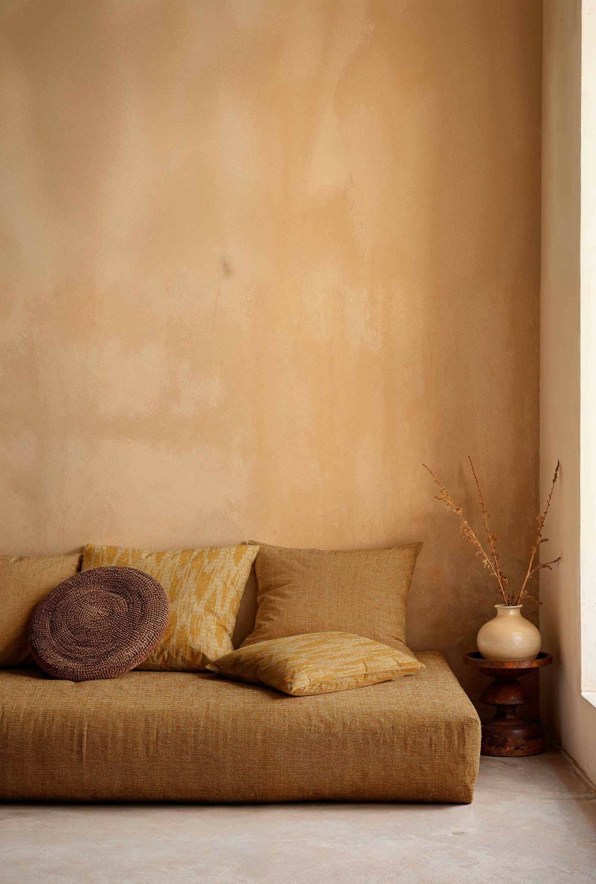 Wave Dune fabric by Coordonné in Curry, shown in a styled room