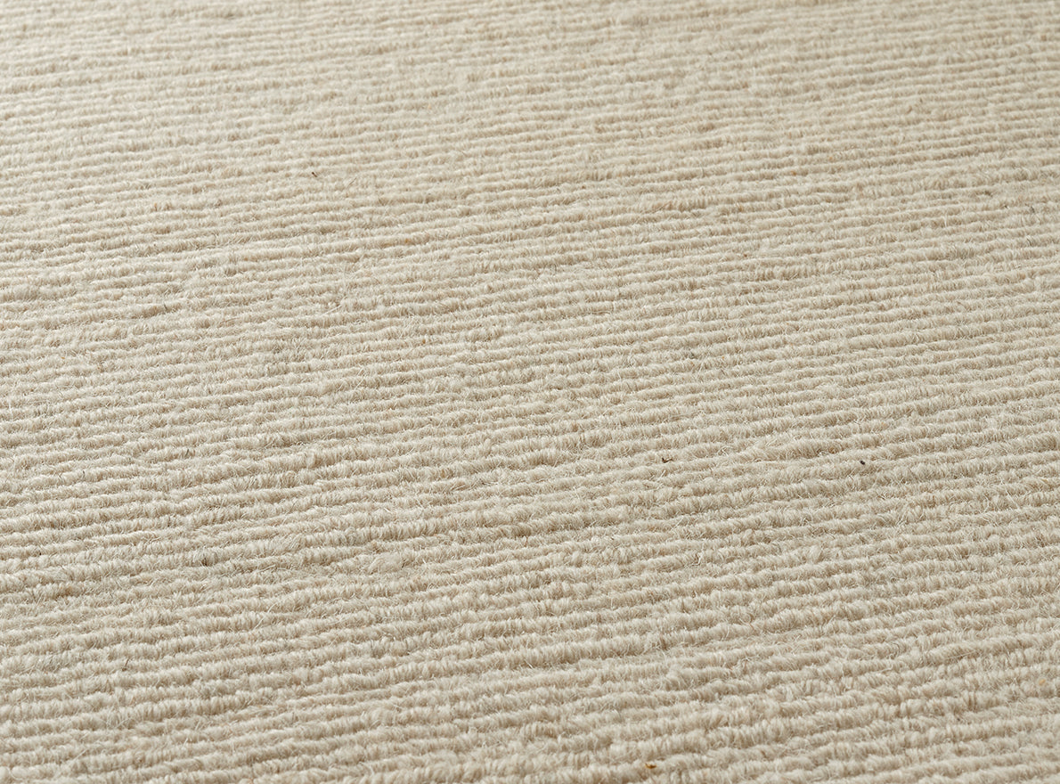 Yu Shan Loop 80 Rug by Pierre Frey shown in a room setting (view 1)