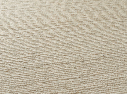 Yu Shan Loop 80 Rug by Pierre Frey shown in a room setting (view 1)